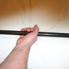 Tambo o bastón corto antiguo, arma tradicional perteneciente a las artes marciales, hecho de madera y aproximadamente 18 pulgadas. Tambo o bastón corto antiguo, arma tradicional perteneciente a las artes marciales, hecho de madera y aproximadamente 18 pulgadas.