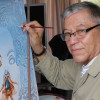 Gilberto Nieto Ceballos, en su taller con el retrato surrealista de Michael Jackson.  Gilberto Nieto Ceballos, en su taller con el retrato surrealista de Michael Jackson.