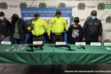 Los escoltas de Guadaña capturados y las armas incautadas.