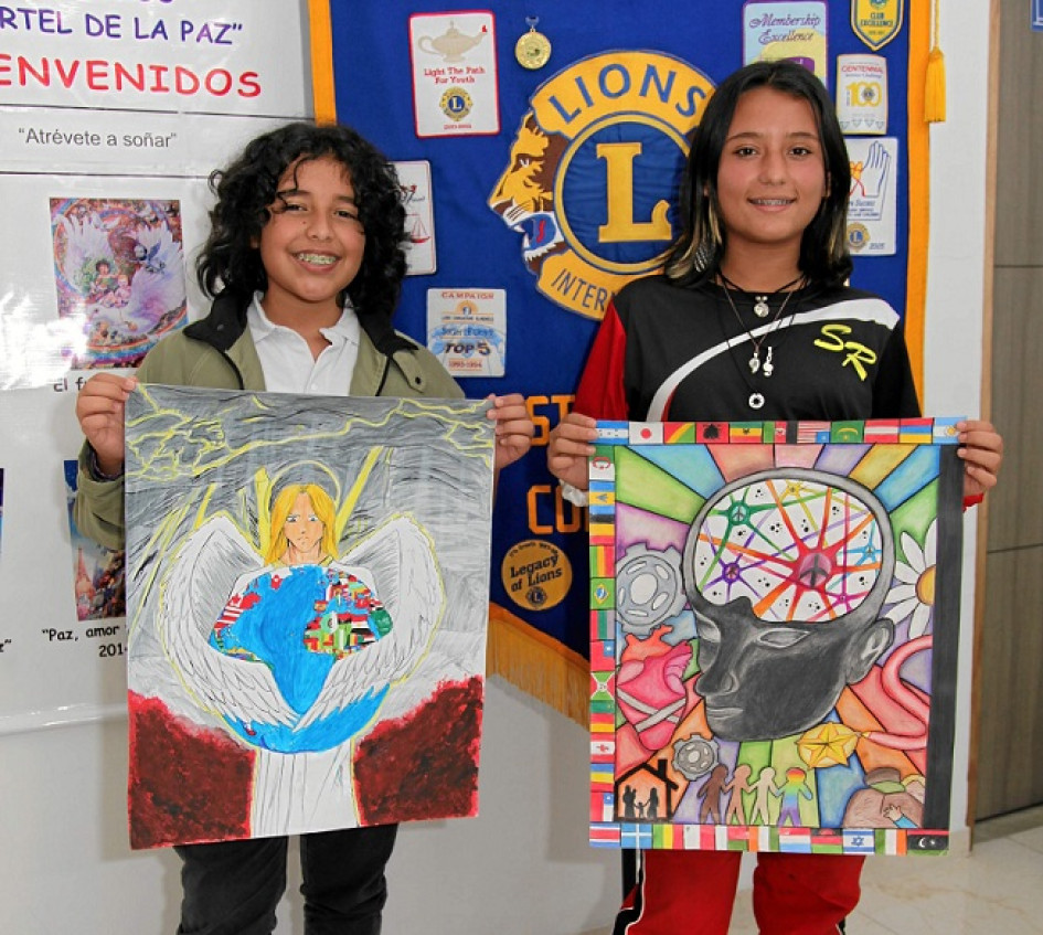 Fotos | Argemiro Idárraga | LA PATRIA Juan Bautista Vargas, del colegio Semenor, e Isabel Cárdenas, del colegio San Rafael, ganadores del concurso.